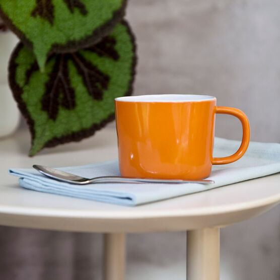 Orange stoneware mug